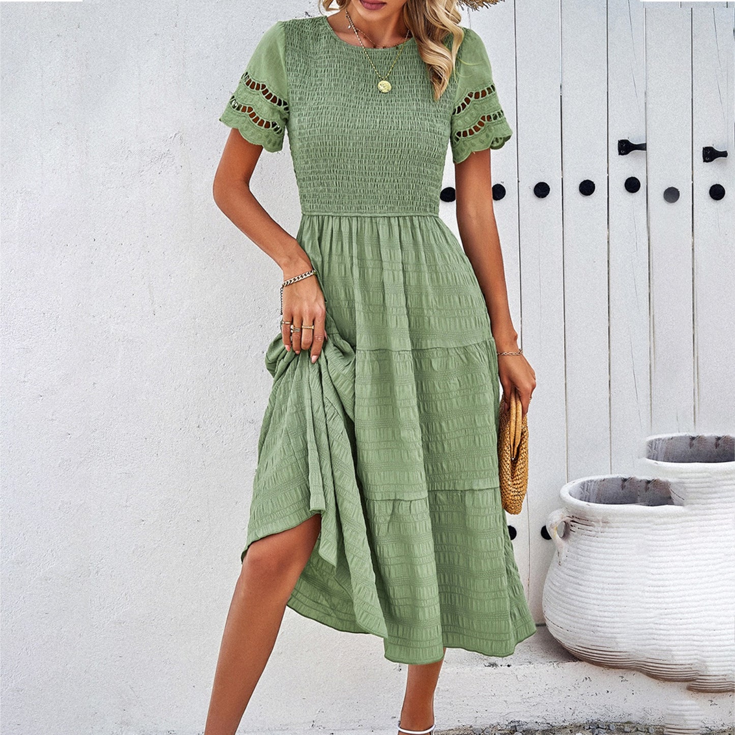 Spring and summer solid color temperament with a pleated hollow dress