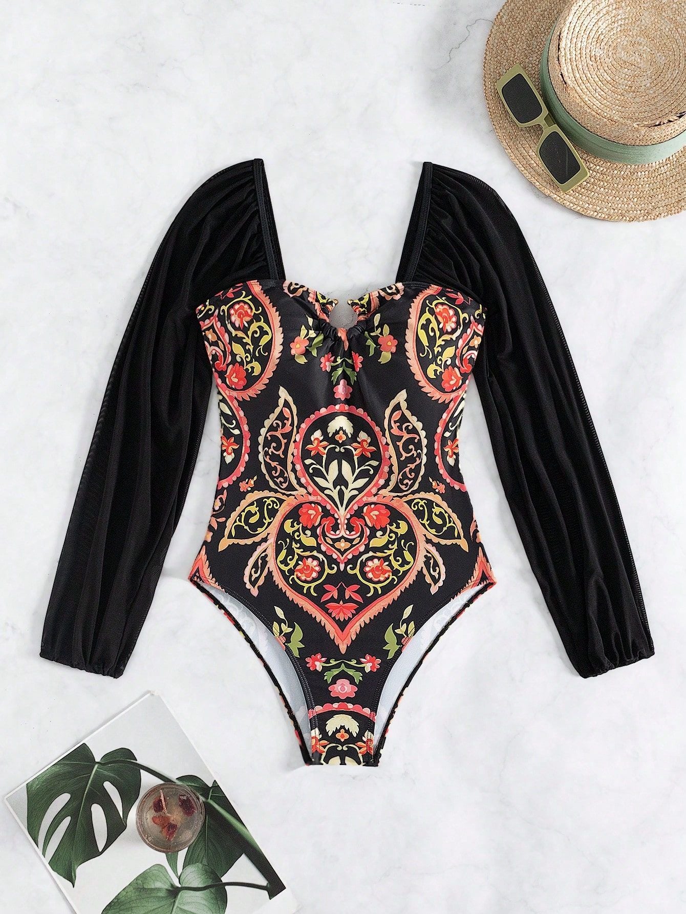 Long sleeved mesh one-piece swimsuit for women